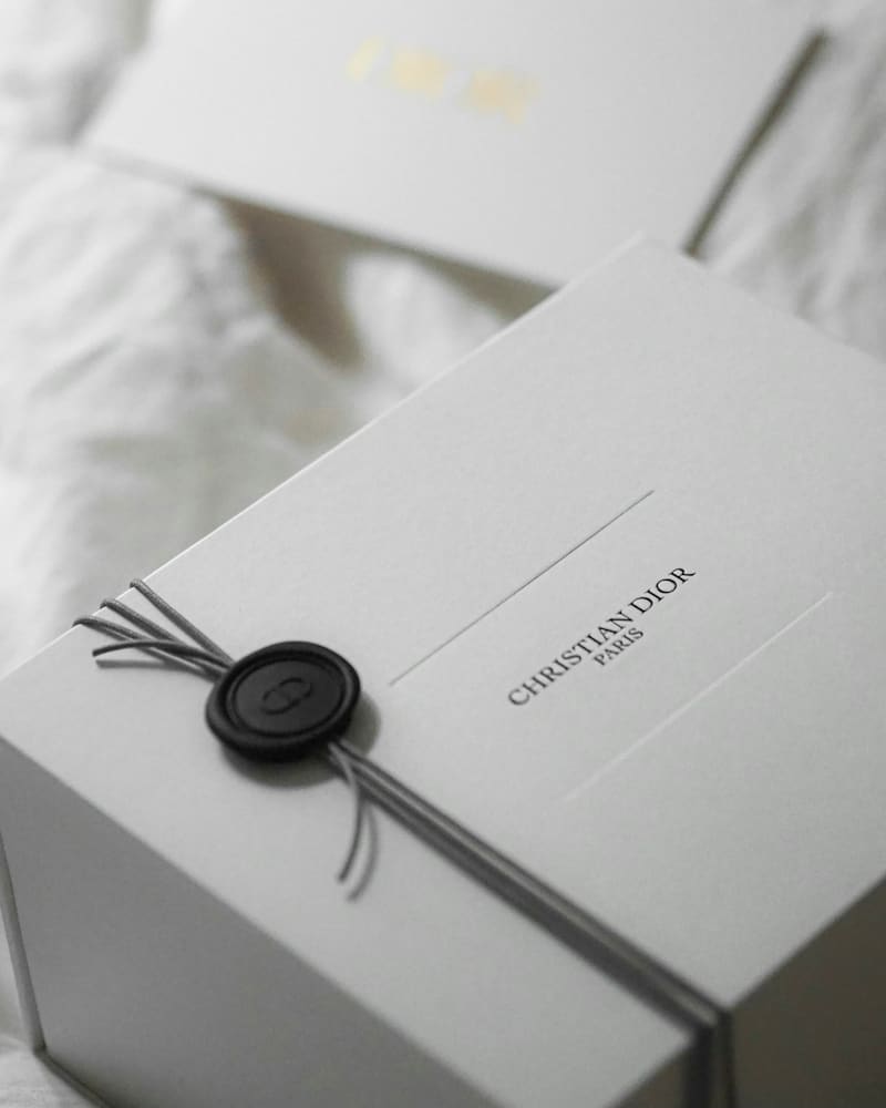 Dior gift box on bed