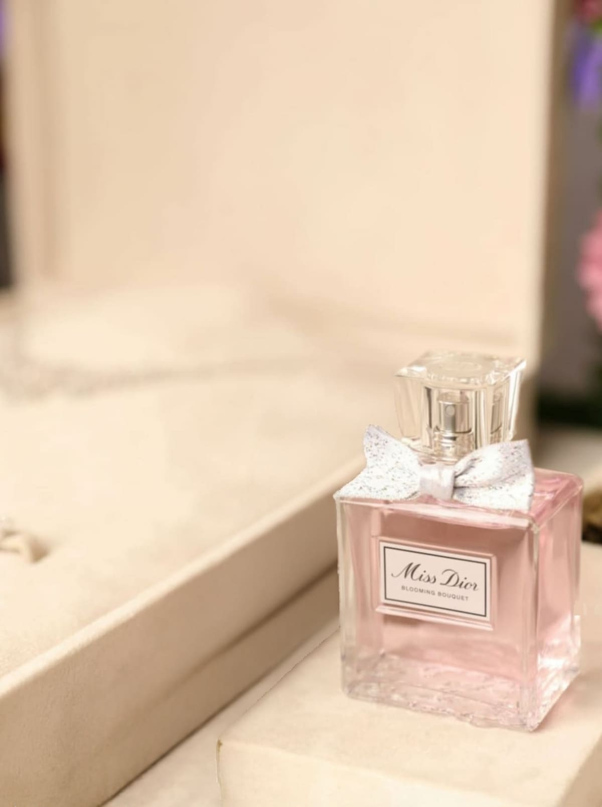 Women's Miss Dior perfume sitting on counter